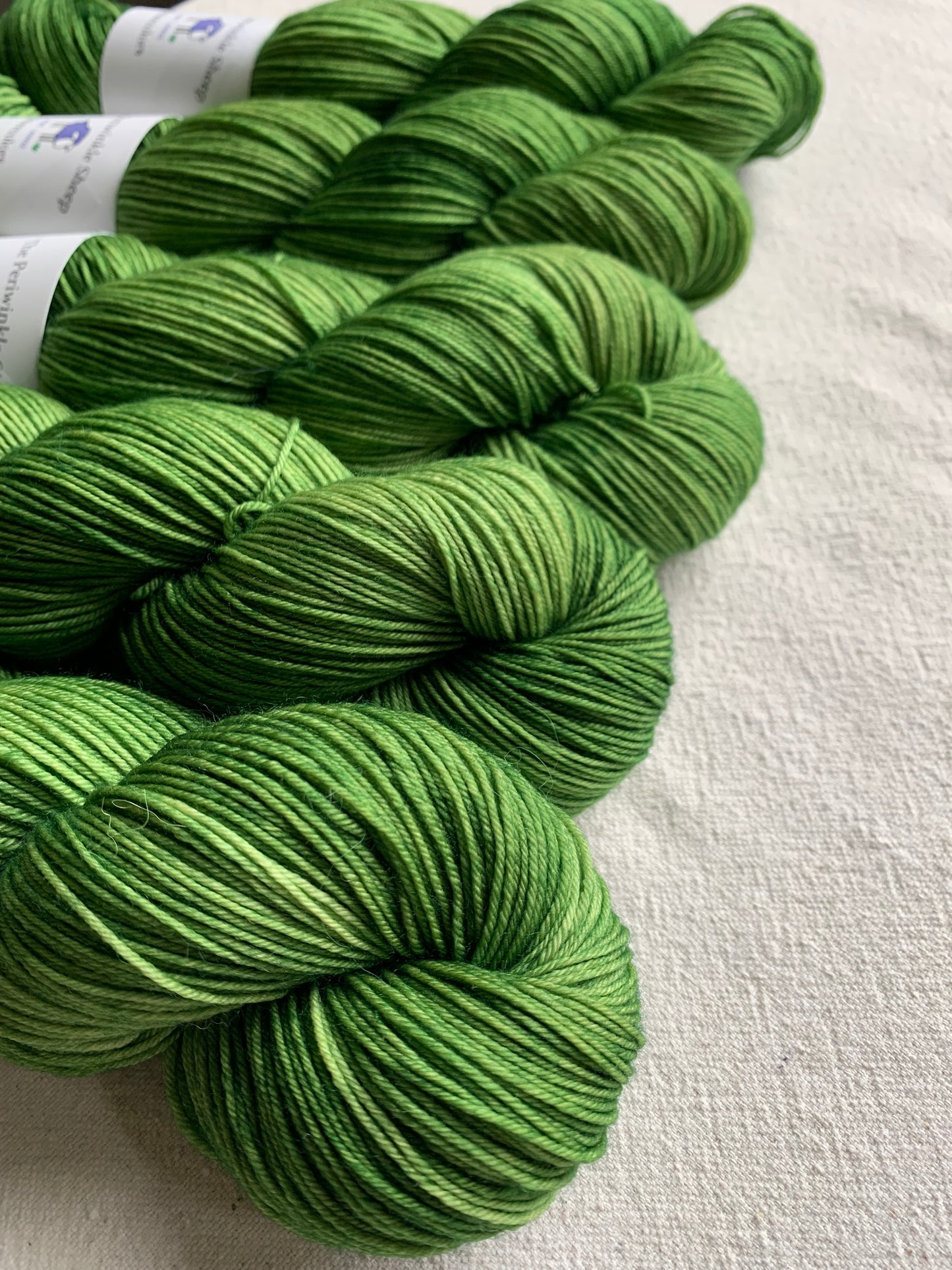 watercolors fingering weight - one of a kind green
